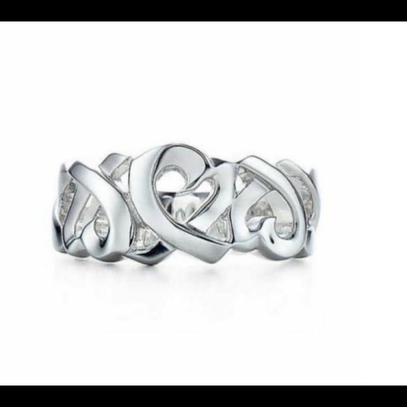 Tiffany & Co. Jewelry - Tiffany and Co . Triple loving hearts ring